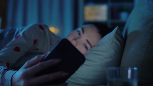 Teenage Girl Awaking Because of Phone at Night alt