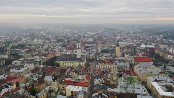 Aerial Hyperlapse Time Lapse, Flight Above the Roofs on Sunset, Old European City, Ukraine Lviv