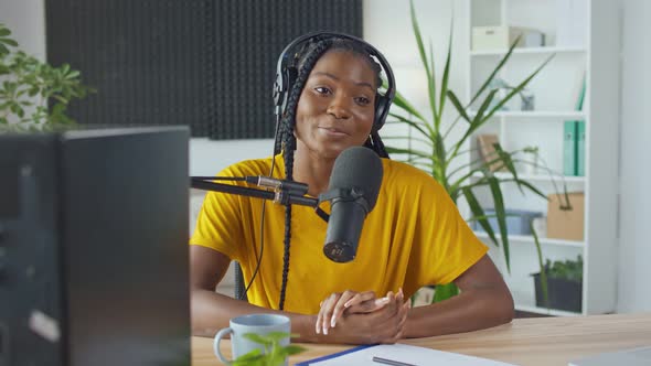 African American Streamer Speaks Into a Microphone Records Morning Radio News alt