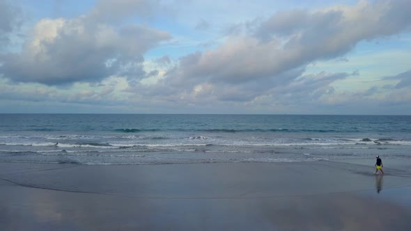 Aerial View of Tropical Beach Island and Ocean. Flying To Horizon alt