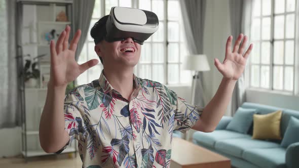 Man Wearing VR Headset At Living Room alt