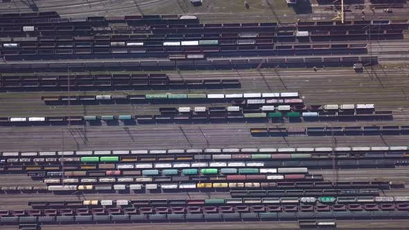 Aerial View of Railway Sorting Station and A Lot of Wagons at a Railway alt