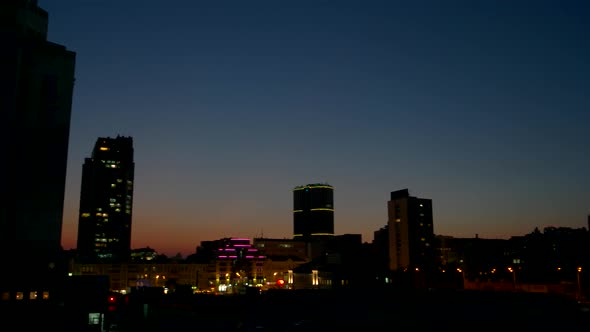 City in the Evening. alt