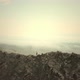 Aerial Close Up  Female Hiker Proudly Standing on Mountain Top on a Cold Cloudy Day in Autumn - VideoHive Item for Sale