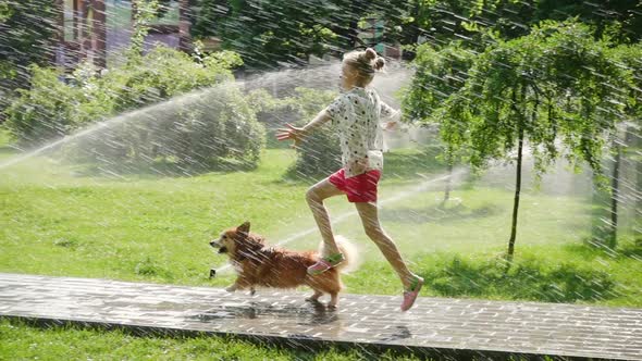 Child Girl Playing With The Dog At The Park 2 alt