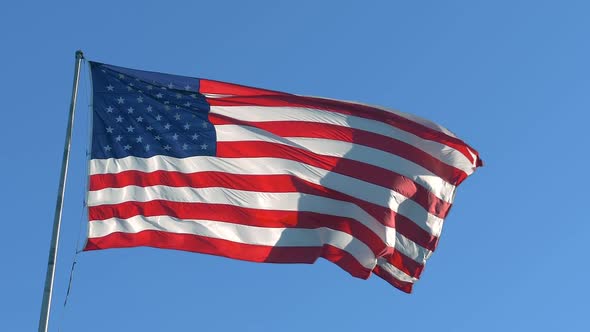 American Flag on a Blue Sky Background, Slow Wave