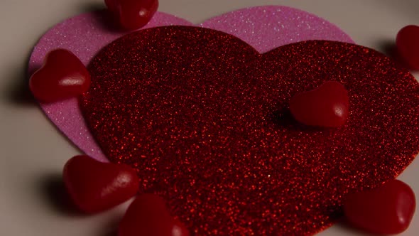 Rotating stock footage shot of Valentines decorations and candies - VALENTINES 0112 alt