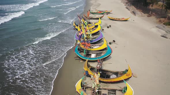 Aerial view of traditional fishing boats in Chittagong, Bangladesh. alt