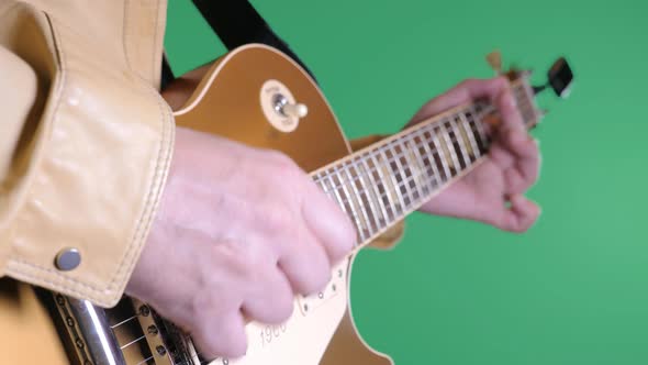 Guitar Player On Green Background alt