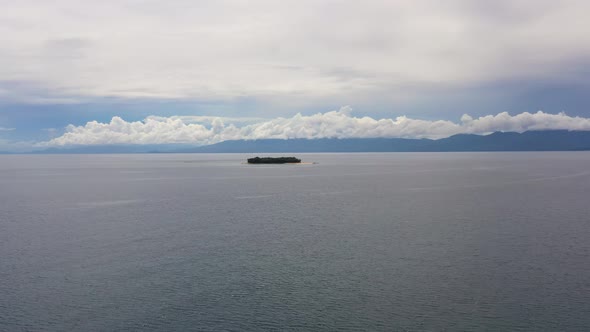 Tropical Island in the Sea. alt