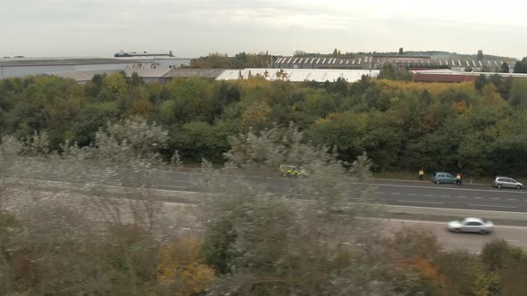 Reveal Shot of Police Attending Accident on a Motorway alt
