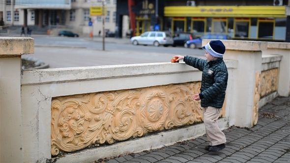  Kid Playing With Car Toy Near Car Traffic 01