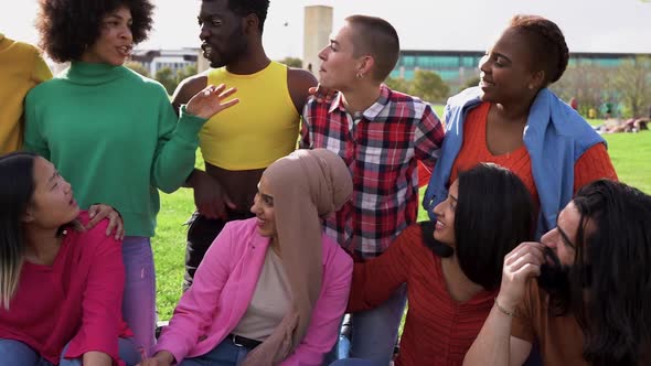Group of young multiracial people having fun together outdoor