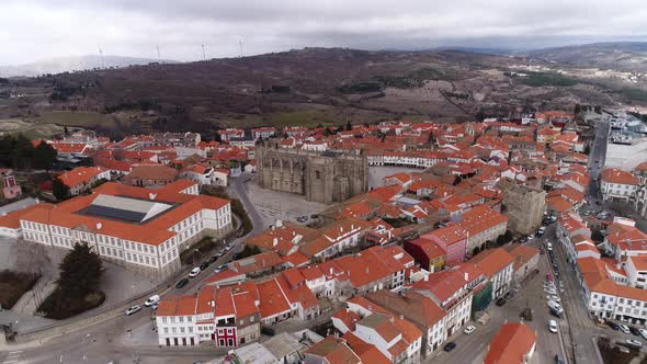 Drone view reveals layout of Guarda city surrounding the Guarda Cathedral alt