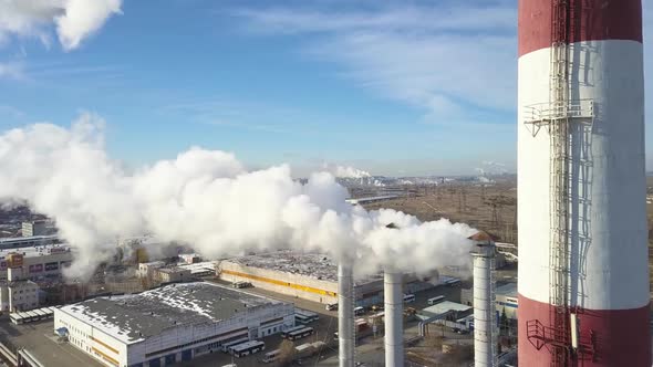 Smoke Comes From the Chimney of the House. The Pipe on the Roof. Chimney. Country House alt