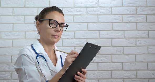 Doctor's work in a suit.  alt