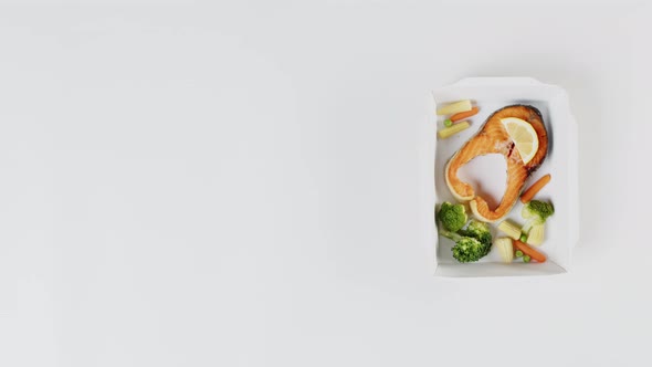 Food Delivery Top View Take Away Meals in Disposable Containers on White Background alt