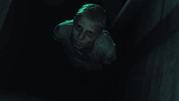 Prisoner The Kidnapped Man Dirty and Fearful In Torn Clothes alt