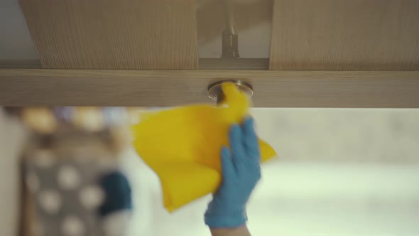 Vertical Video. Closeup of Woman Hands Using a Sanitizer and a Wet Towel for Disinfection Doors Knob alt