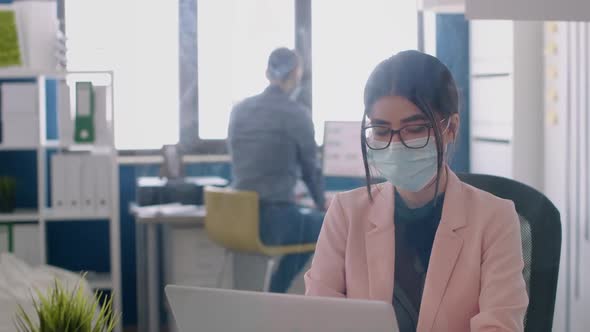 Portrait of Entrepreneur Woman Wearing Face Mask to Avoid Infection with Coronavirus alt
