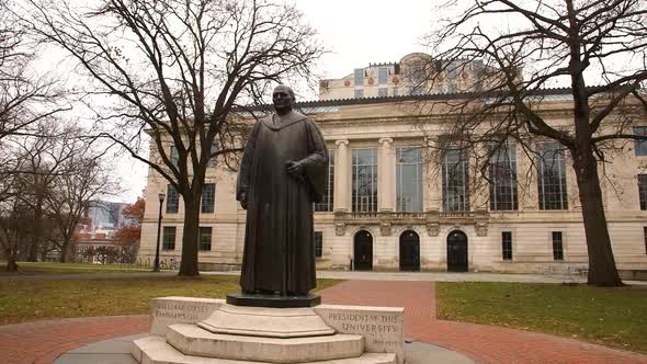 Statue of William Oxley Thompson on the campus of Ohio State University in front of the Thompson Lib alt