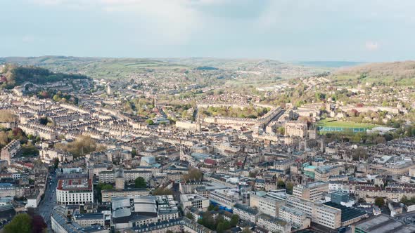 Rising drone shot over old buildings in Bath UK alt