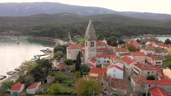 Aerial view of man-made canal crossing the city of Osor, Croatia. alt