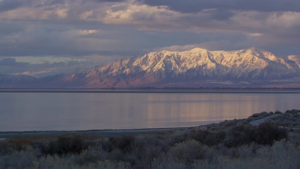 epic beauty Utah mountains rolling by sunset lake in cinematic slow motio alt