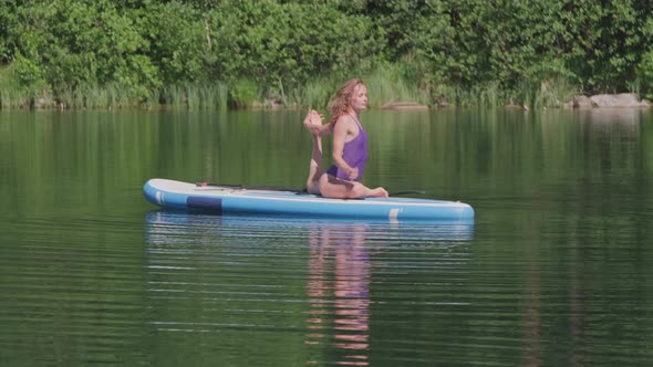 Female Yoga Posing Outdoors alt