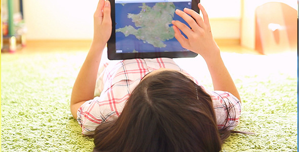 Teenage Girl Searching on Digital Tablet 1 alt