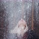 Young Cute Girl Throws Snow Into the Air in the Forest - VideoHive Item for Sale