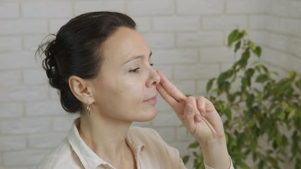 Woman Exhaling Nose Exercises alt