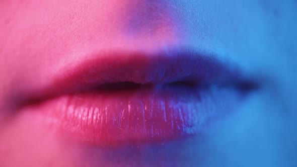 Female Lips in Neon Light