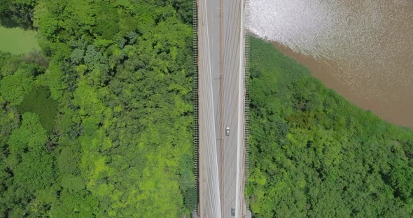 Aerial view on the Mauricio Báez Bridge with the higuamo river in the background, murky waters alt