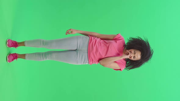 Portrait of Young Smiling Female African American Laughs Cheerfully alt