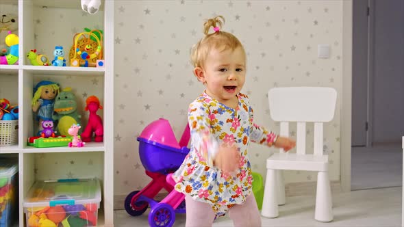 The Child Plays with Toys in the Room alt