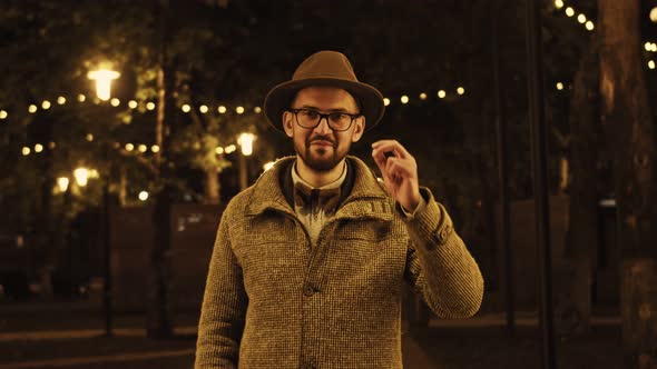 Portrait of Successful Smiling Male Entrepreneur Standing in Business District alt
