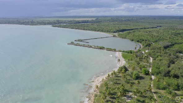 Soco river mouth and surrounding landscape in Dominican Republic. Aerial forward alt
