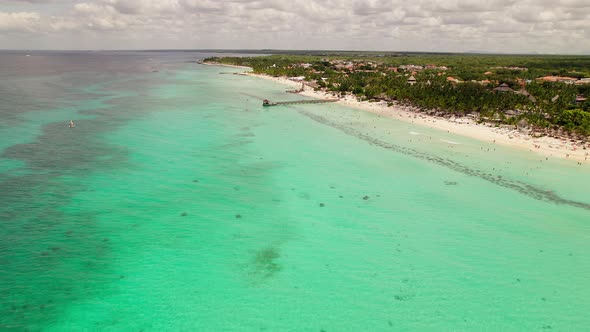 Aerial top view drone move Beautiful topical beach with white sand.
