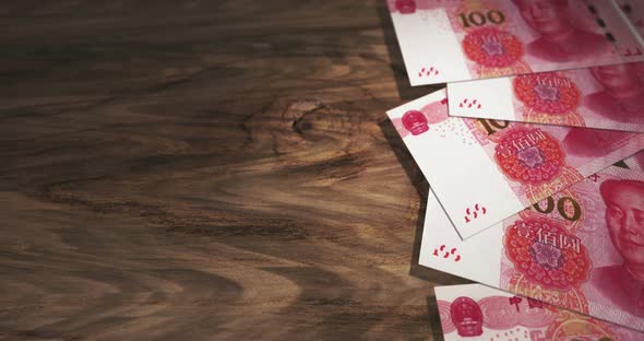China Yuan 100 CNY money banknotes background loop
