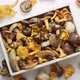 Variety of Fresh and Raw Forest Mushrooms Packed in Wooden Box - VideoHive Item for Sale