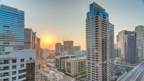 Aerial View of Dubai Marina From a Vantage Point at Sunset Timelapse alt