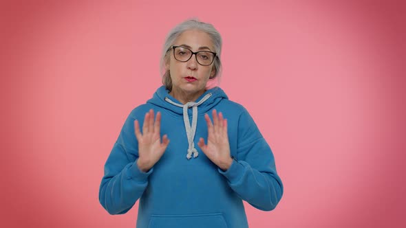 Elderly Granny Old Woman Closing Eyes with Hand Showing Stop Gesture Confused Shy Scared to Watch alt