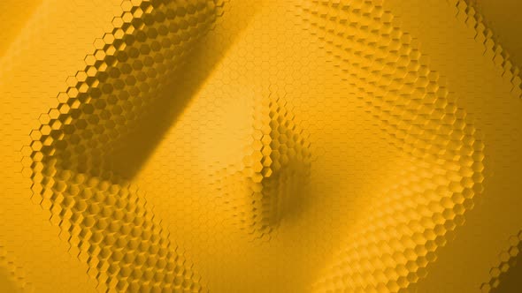 yellow mosaic surface with moving hexagons In the form of a shape 