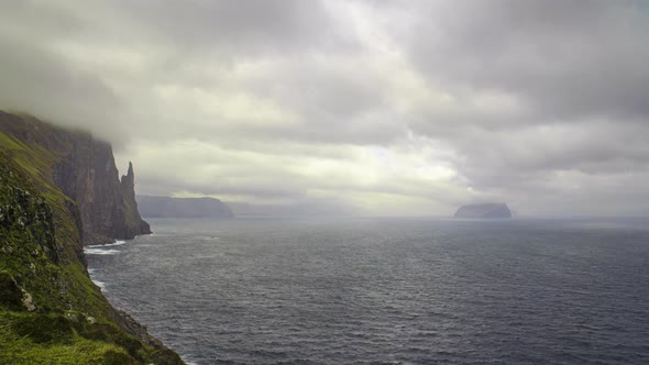 Dramatic Coastline Of Clouds Sea And Misty Cliffs alt