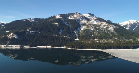 Snowy Mountain Clear Reflection Frozen Lake Keechelus Snoqualmie Pass Washington alt