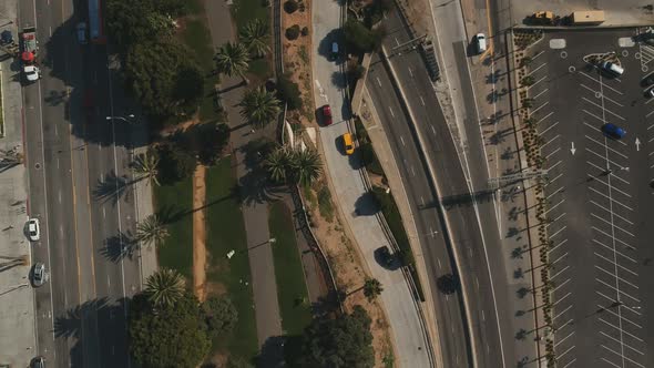 Afternoon drone view from a pedestrian park near the Pacific Coast Highway, Santa Monica Beach, Cali alt
