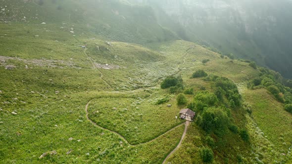 Landscape with Rural House on Green Hill Top of Old Mountain