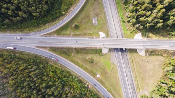 View From a Drone to a Suburban Junction with a Small Number of Cars alt