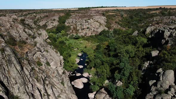 A Drone Shot of a Rocky Canyon Late in the Autumn